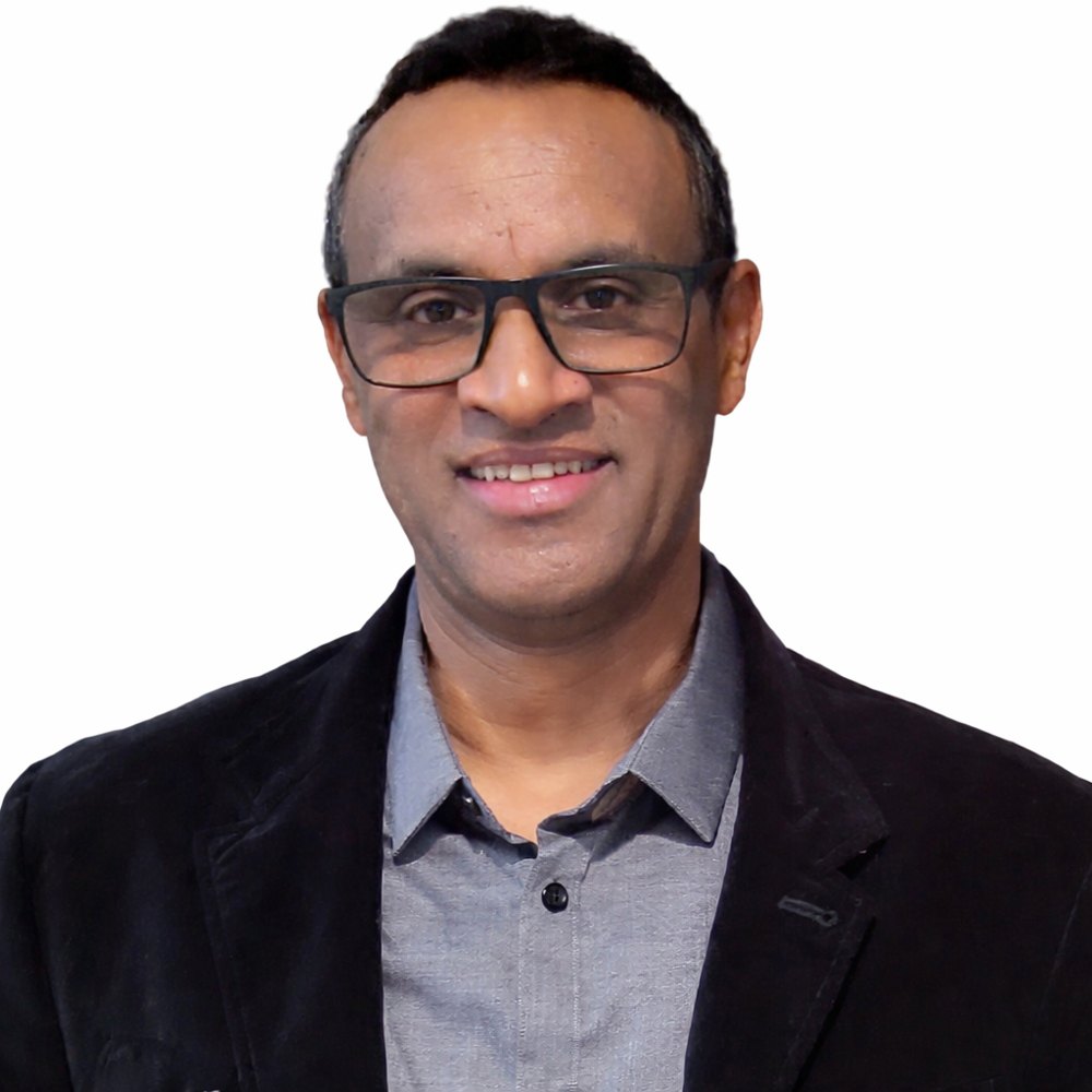 Dereje Desta, journalist and linguist, in a professional portrait